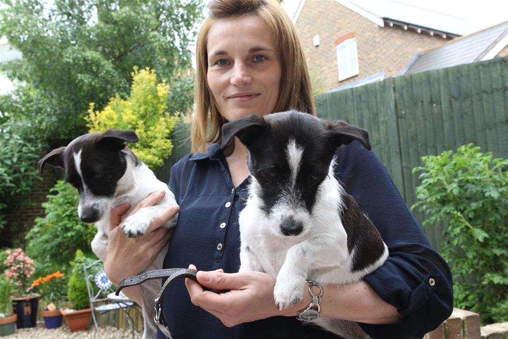 Sophie Coleman with her two-year-old Jack Russells Milly and Mitzy who got tangled up in the buckle collar