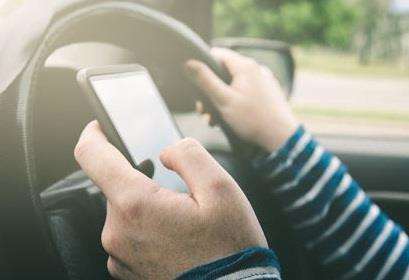 It's a criminal offence to use a mobile phone while driving