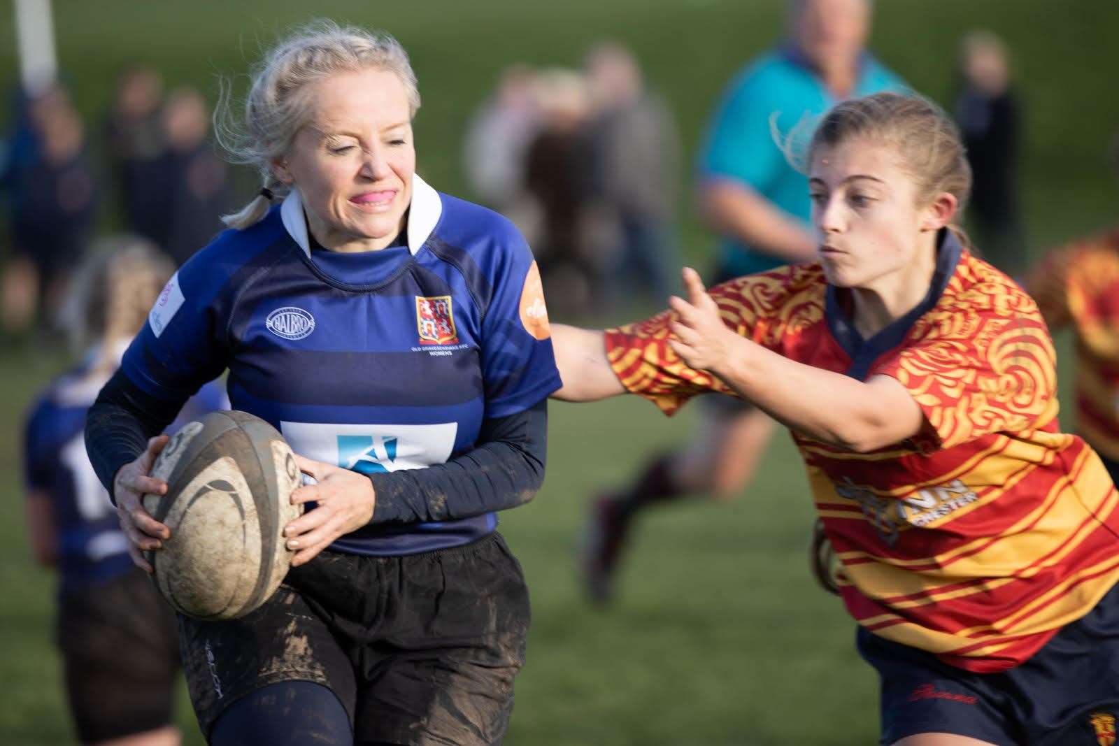 Old Gravesendians' Lucie Osborn, left, in determined mood against Medway. Picture: Alison Pretious Photography