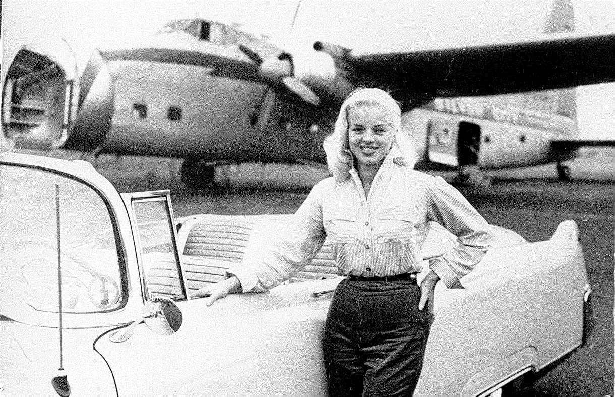 Diana Dors - pin-up movie queen - at the airport