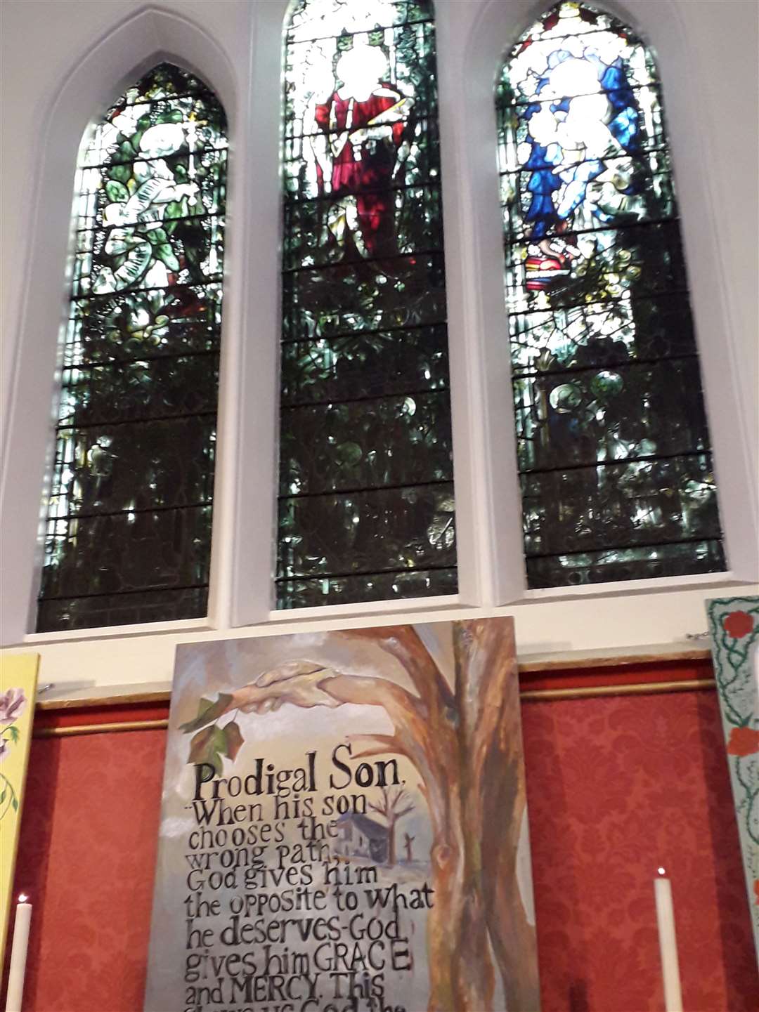 Ivy is blocking out light from the stained glass window at Holy Trinity Church in Trinity Road, Sheerness