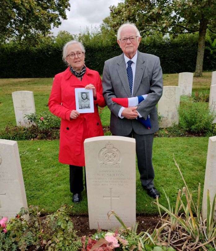 Bill Whight and his wife Jude, stand at the graveside of his uncle, LCpl Neville Skilton