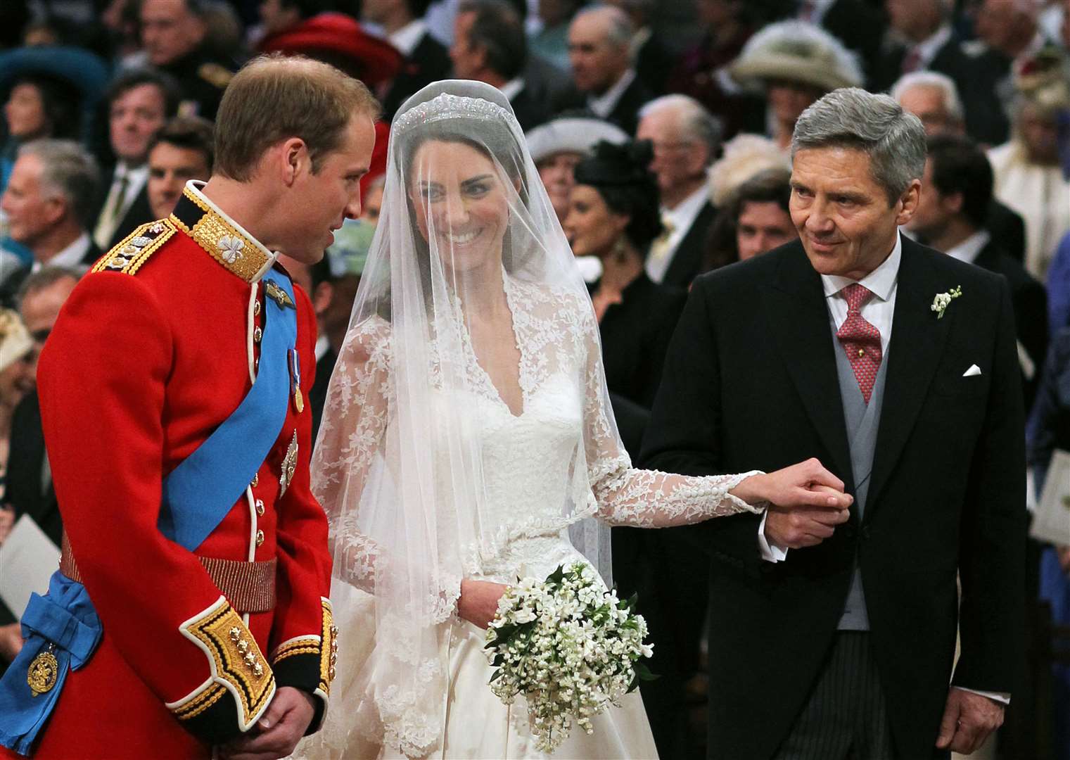 William and Kate at the altar on their wedding day, with the duchess’s father Michael Middleton (Dominic Lipinski/PA)