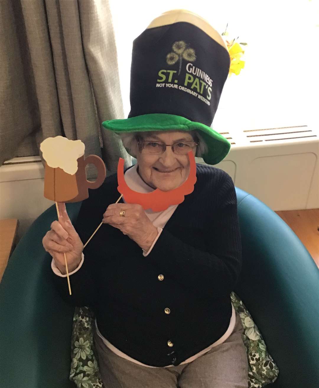 Resident Margaret Smith enjoys Dene Holm's St Patrick's Day celebrations