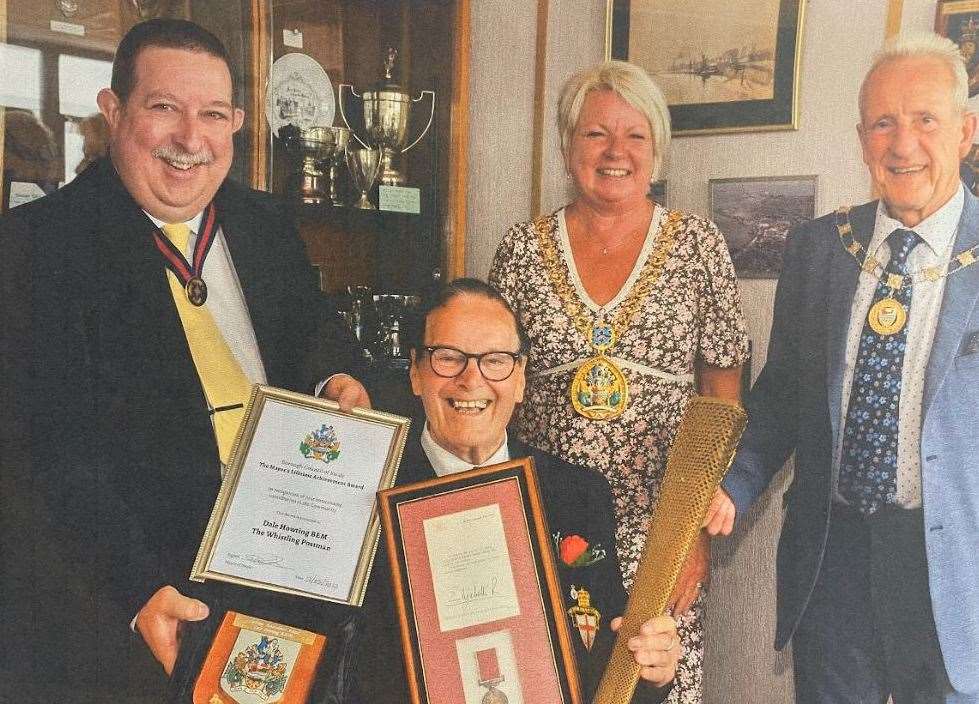 Cllr Simon Clark presents Whistling Postman Dale Howting with the Mayors Lifetime Achievement Award alongside Cllr Sarah Stepehen and Paul Stepehen