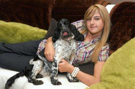 Sophie Johnson, aged 17, with her dog Jasmine. Sophie had dogs removed by the RSPCA.