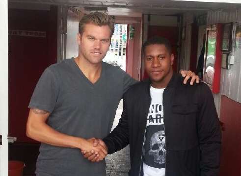 Ebbsfleet United manager Daryl McMahon shakes hands with new signing Bradley Bubb