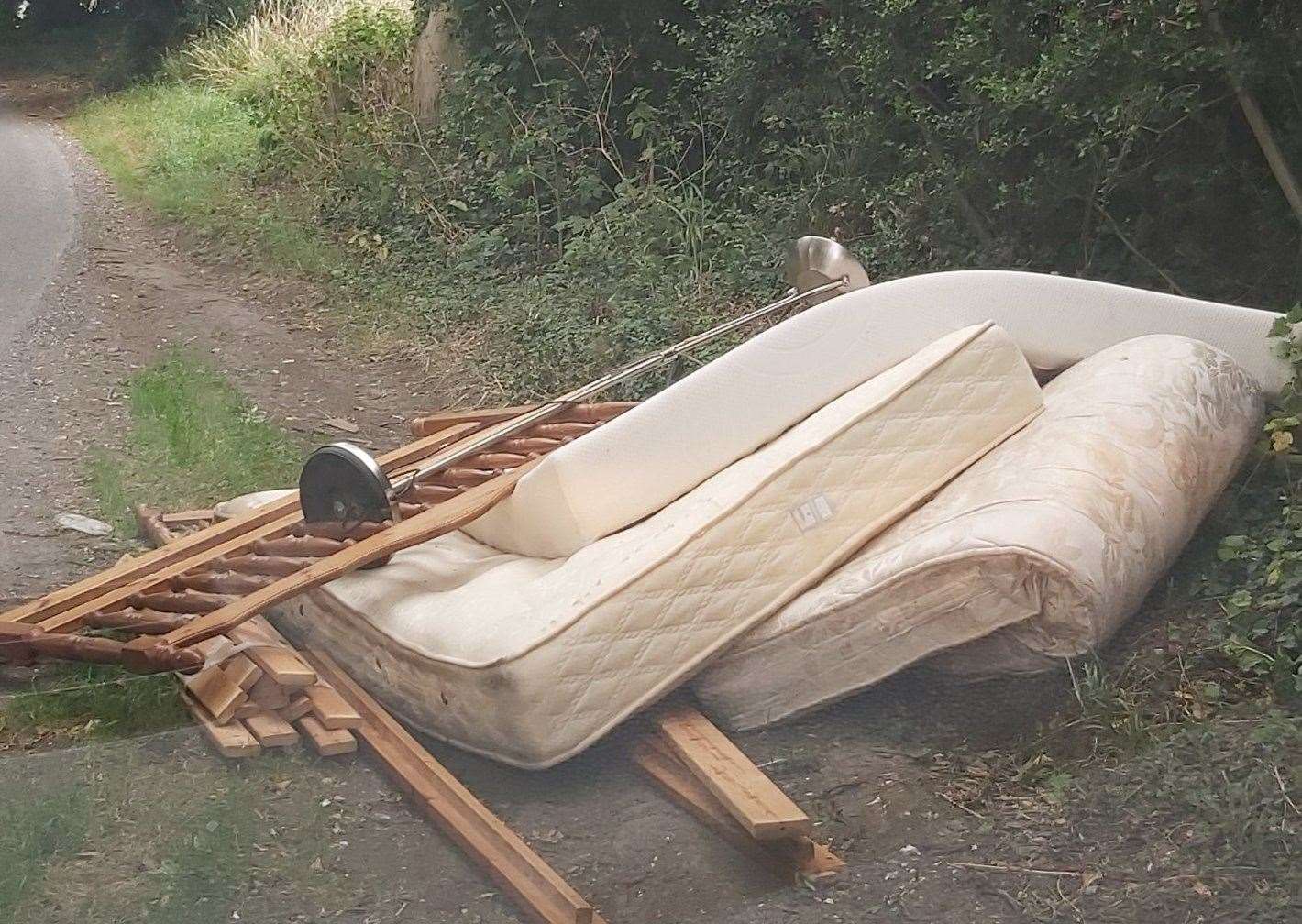 Bedroom furniture, including a mattress and lamp, were some items fly-tipped in Gravesham. Picture: Kent Police