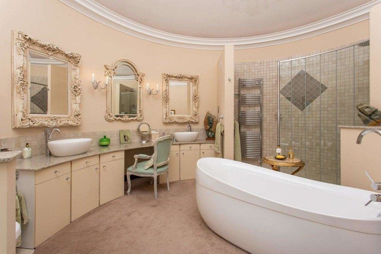 Relax and unwind in the luxurious master en-suite bathroom. Picture: Miles and Barr