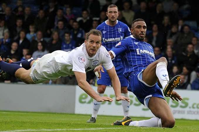 Leon Legge is likely to miss Gillingham's trip to Peterborough. Picture: Barry Goodwin