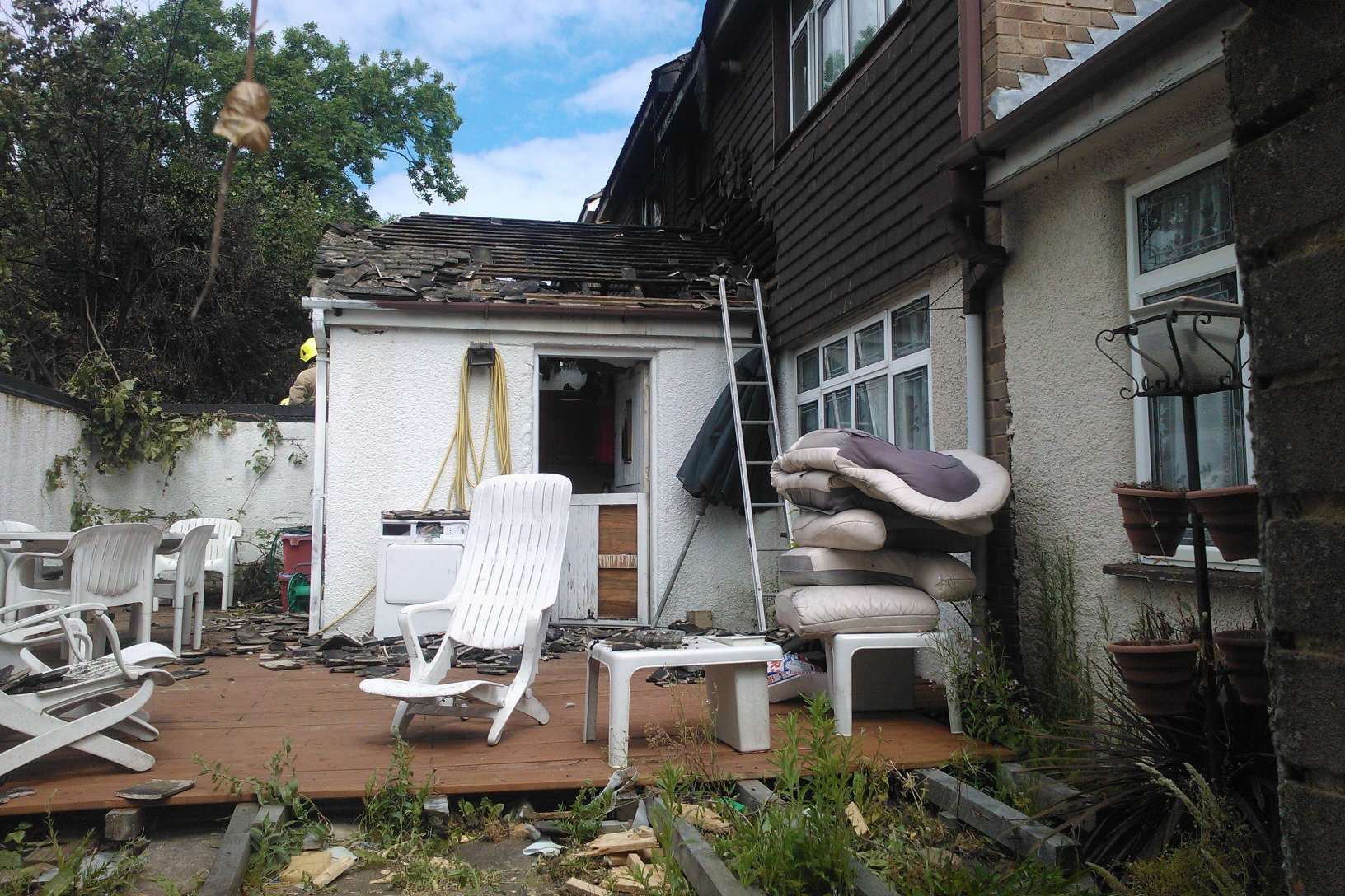 Damage to the roof of one of the homes
