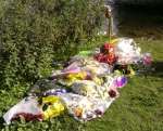 Flowers laid in memory to Brian Anderson at Leybourne Lakes