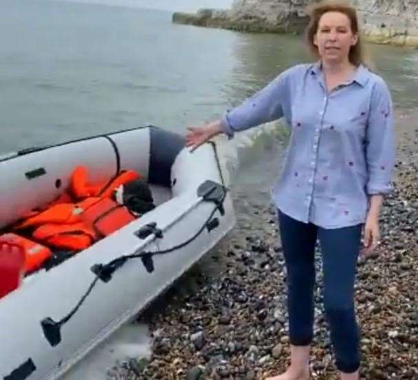 Natalie Elphicke stood next to the first of the boats to arrive today. Picture: Twitter/@NatalieElphicke (40621991)