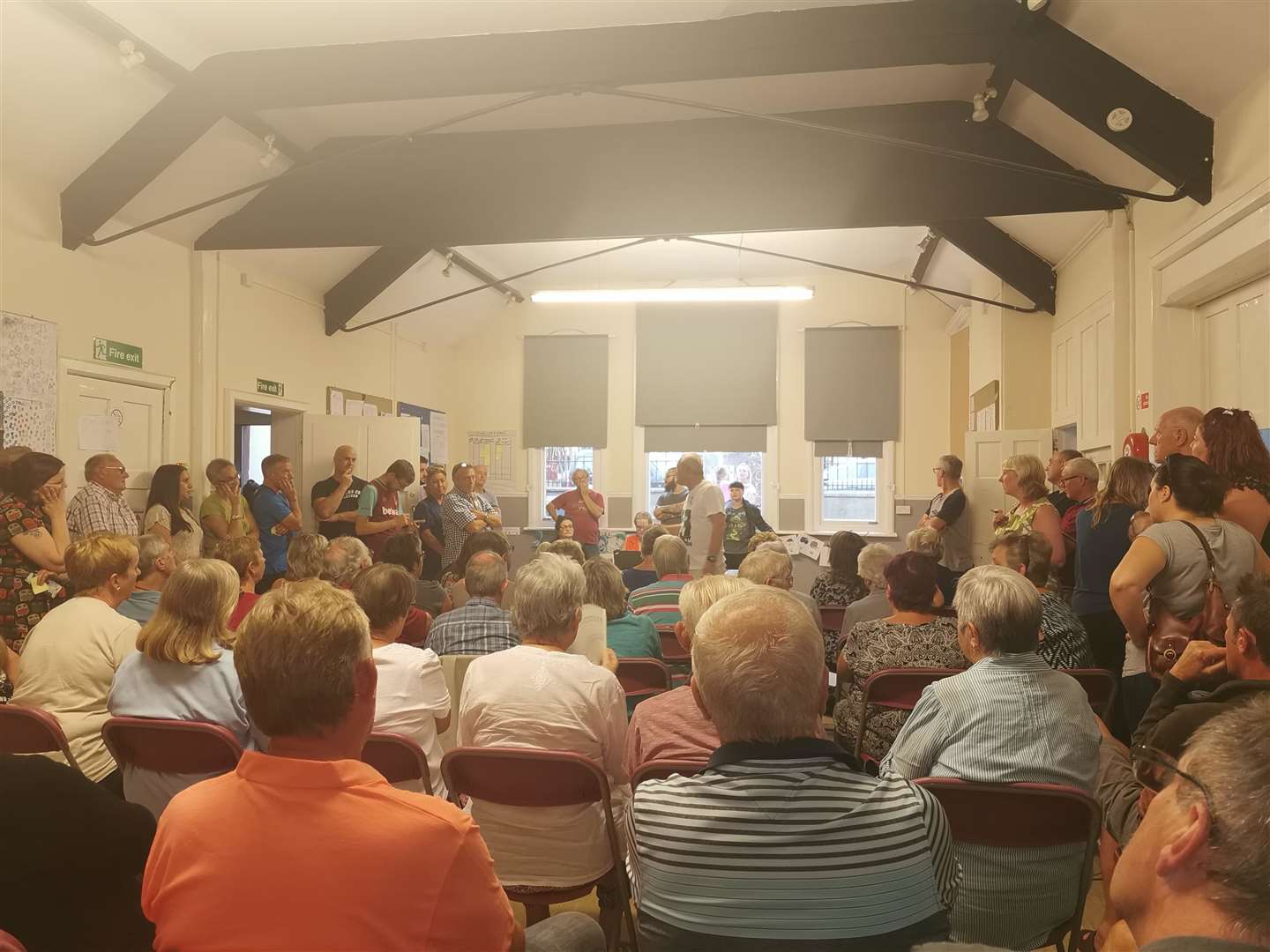 The packed meeting in the village hall