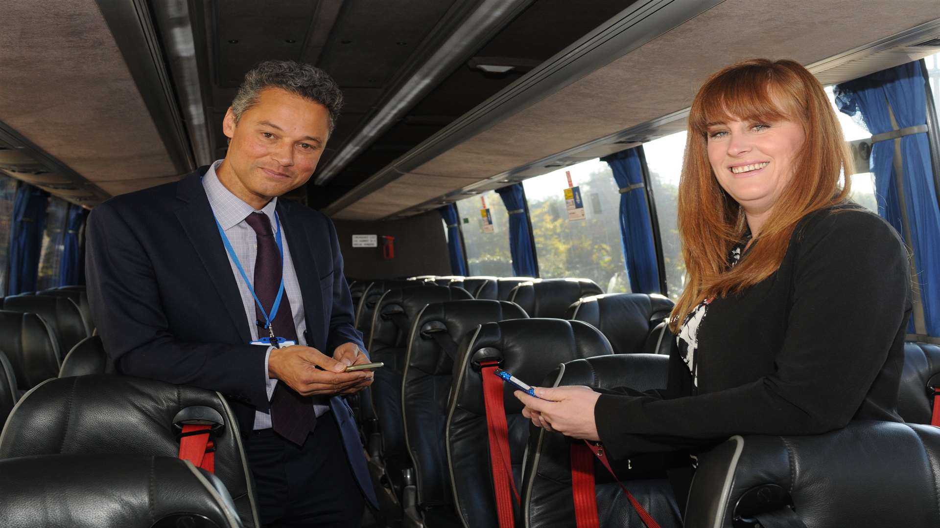MP Kelly Tollhurst and Icomera sales director Peter Kingsland use the firm's wifi on a Chalkwell coach