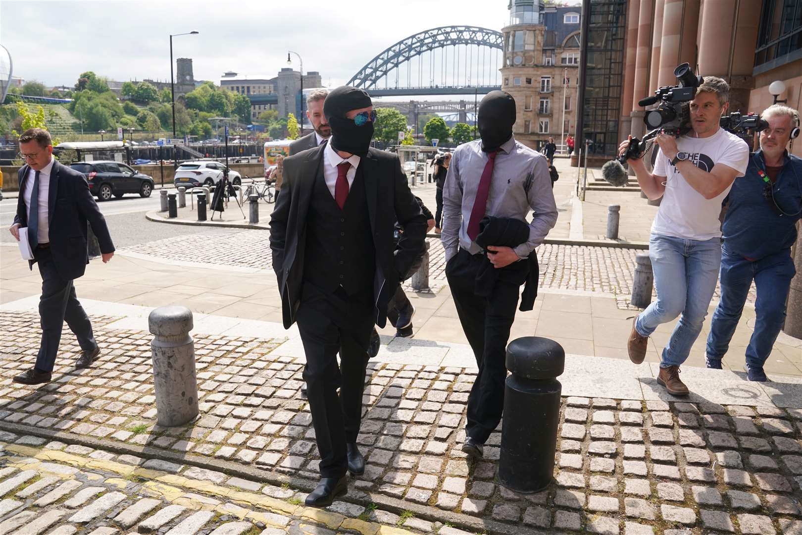 Daniel Graham (centre-left) and Adam Carruthers (centre-right) leaving Newcastle Upon Tyne Magistrates’ Court (Owen Humphreys/PA)