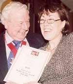DEDICATED: Lyn Richards receives her award from Cllr Chris Capon