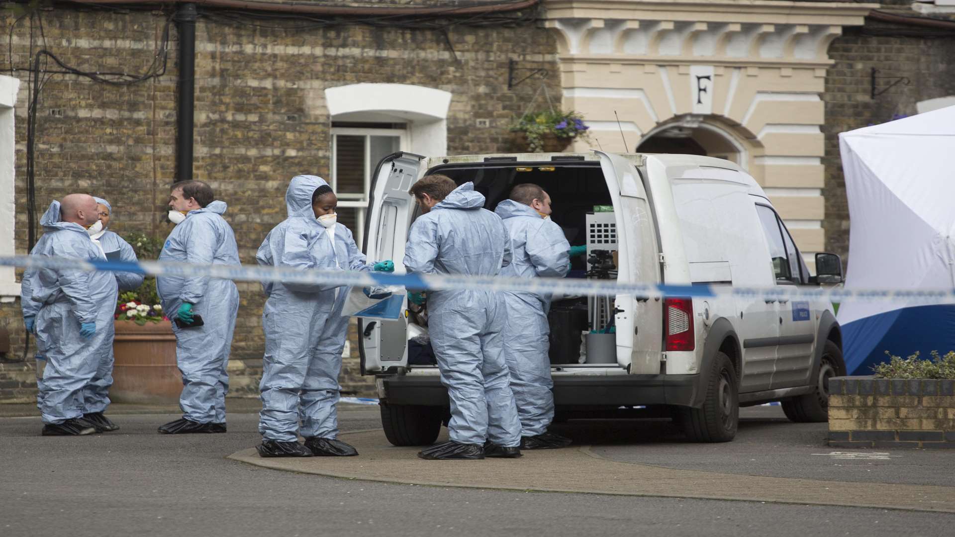 Forensics officers at the scene investigating Gordon Semple's death. Picture: SWNS