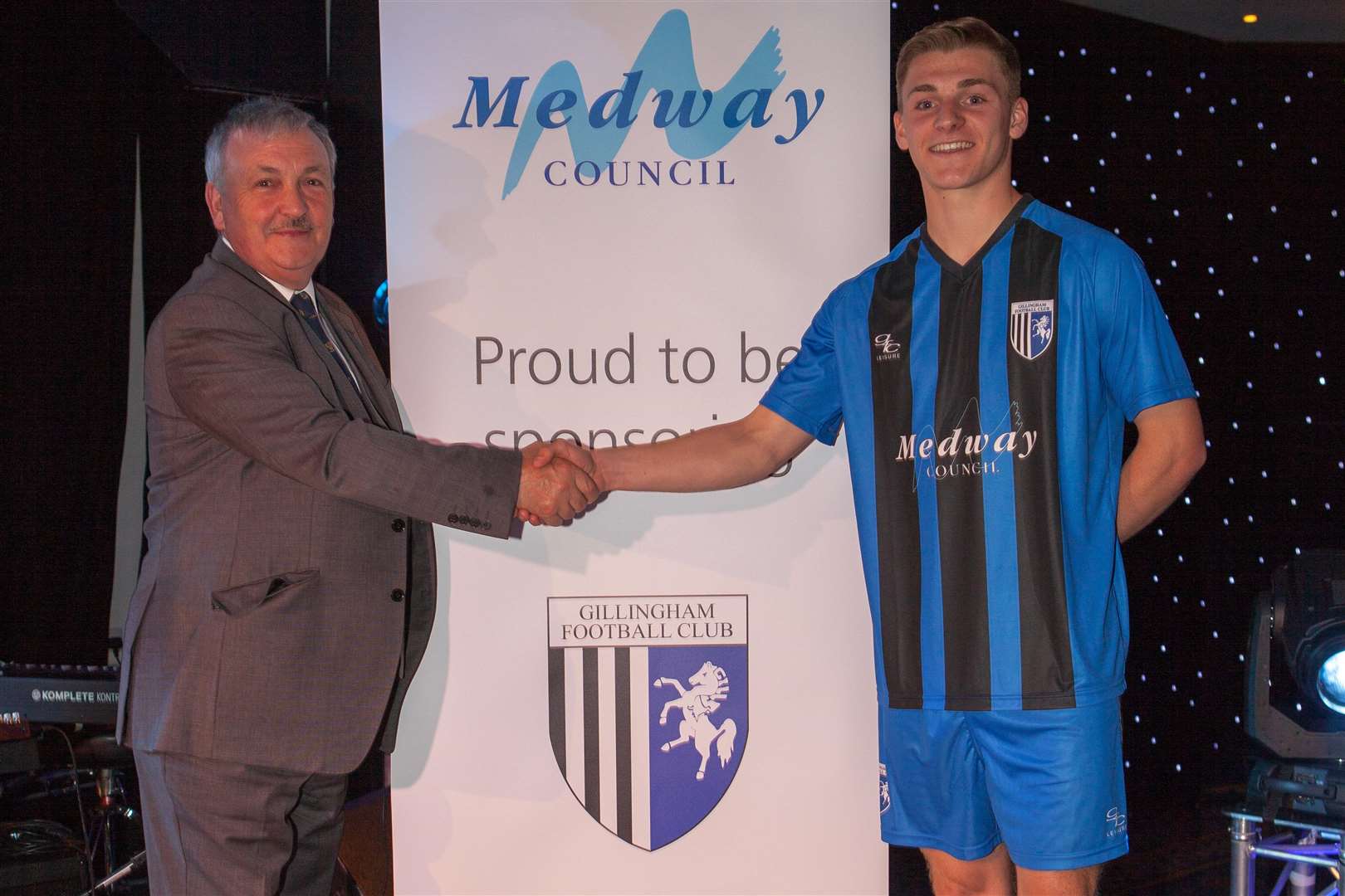 Cllr Alan Jarrett with young player Henry Woods sporting the new kit. Credit:Kent Pro Images (1863444)
