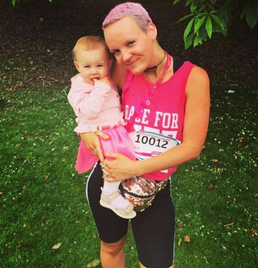 Danielle with daughter Joey, exercising after a chemotherapy session