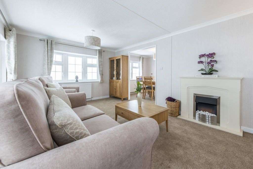 The living room is cosy and comfortable. Picture: Quickmove Properties