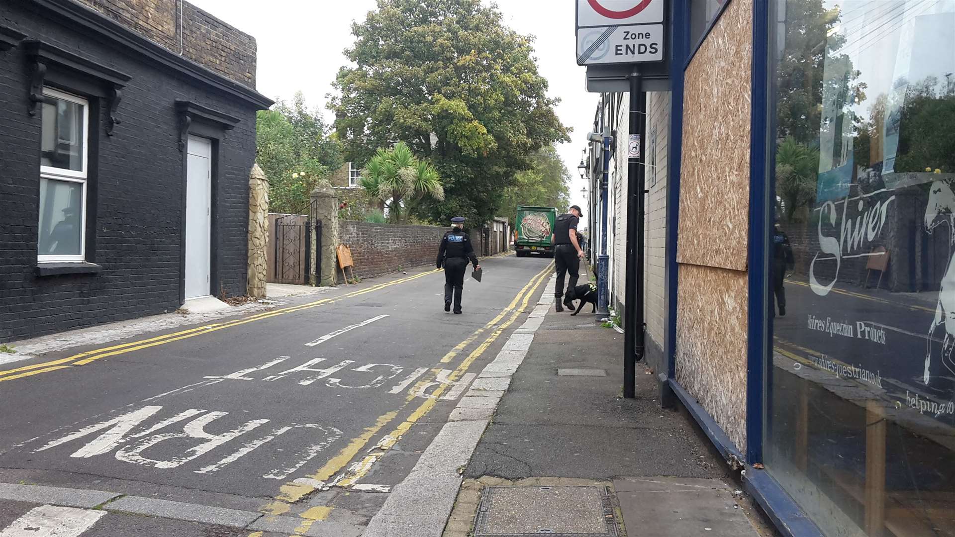 Officers were seen combing through Beach Street, off Sheerness High Street, with a sniffer dog