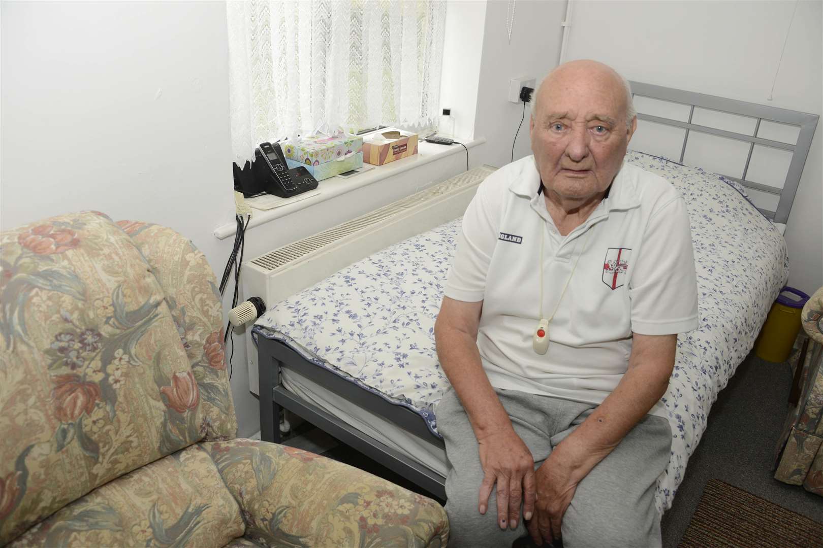 Mittell Court resident Reginald Mooby with one of the radiators that doesn't work properly. Picture: Paul Amos