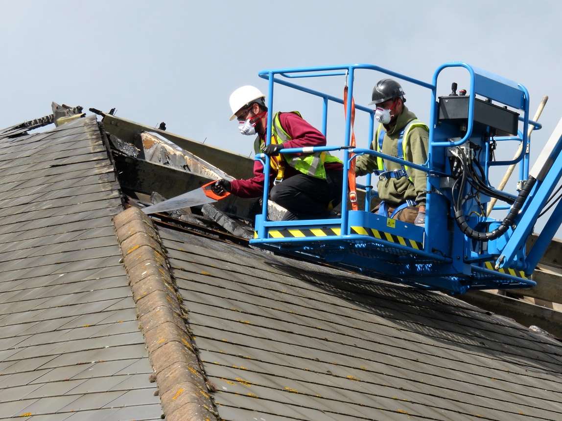 Repairs are under way to the fire-damaged roof of the Tesco Express in Mace Lane, Ashford Picture courtesy: Andy Clark