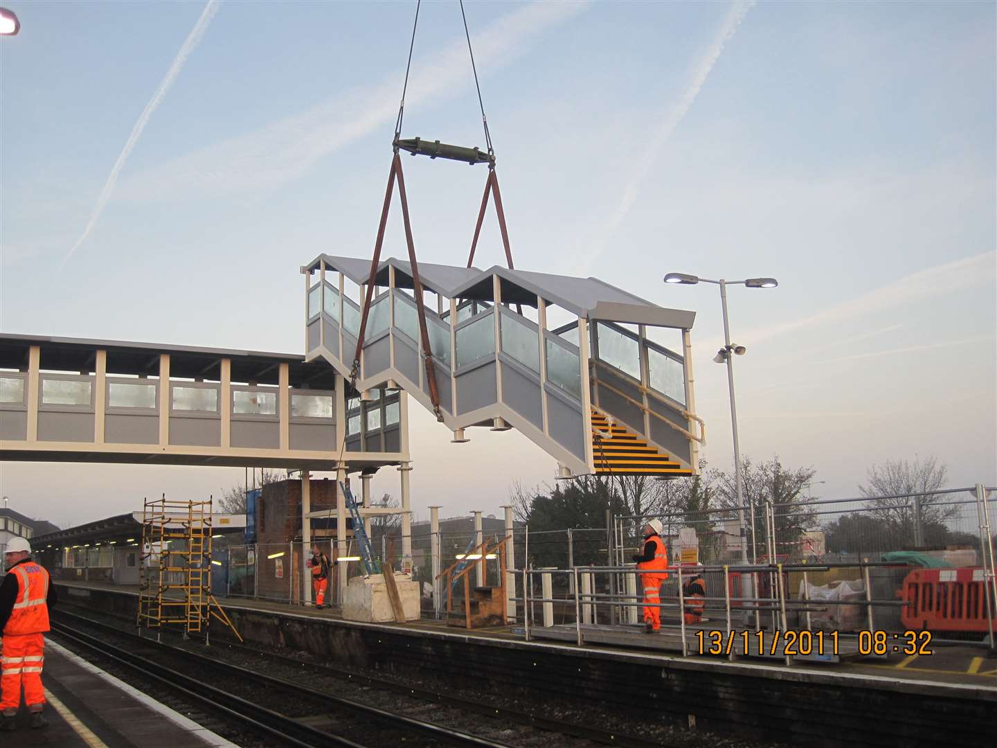 The new pedestrian bridge at Sittingbourne railway station being lifted into place. Picture: Network Rail