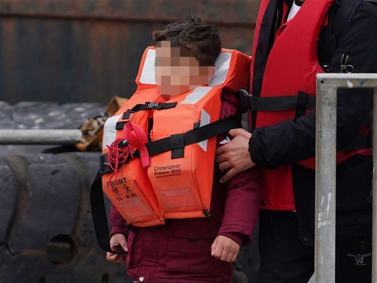 Children were brought ashore in Dover on Tuesday. Picture: Gareth Fuller/PA