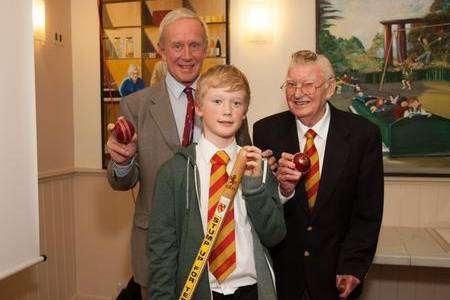 Derek Underwood, colts captain Louis Skinner, 11, and Don Newick, 80, ex-player and employee of Alfred Reader