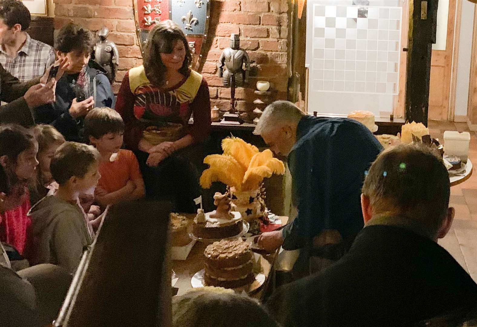 Paul Hollywood at a charity cake baking contest in The Chequers Inn