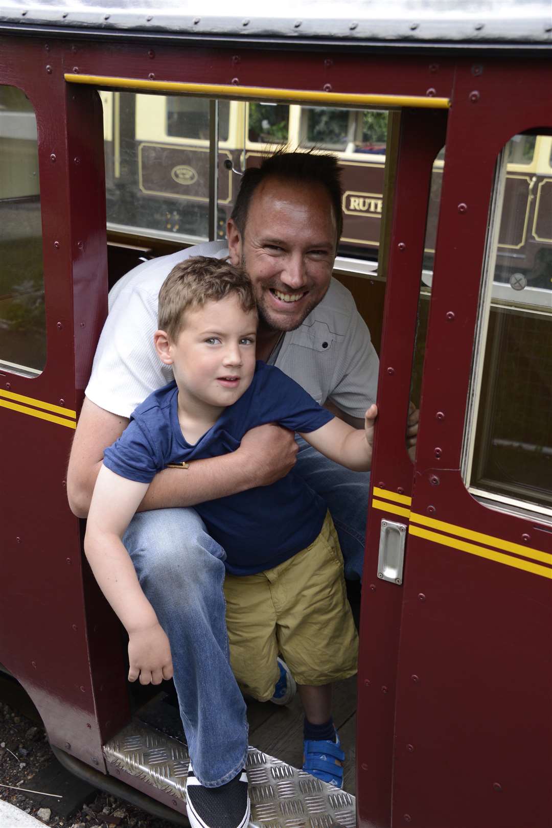 Adam Baxter and Charlie, 4, enjoy a ride