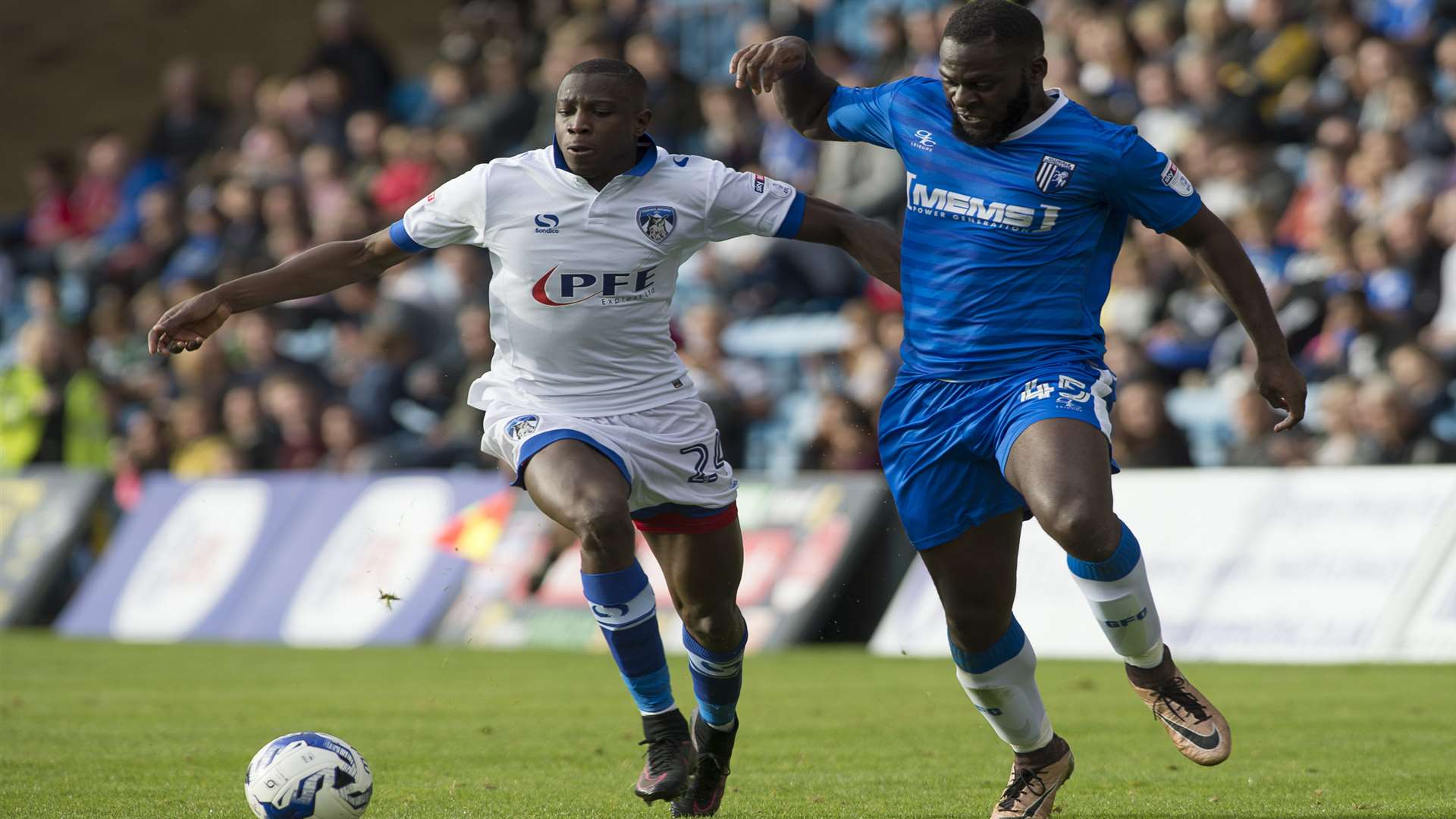 Frank Nouble battles with Oldham's Ousmane Fane on Saturday Picture: Andy Payton