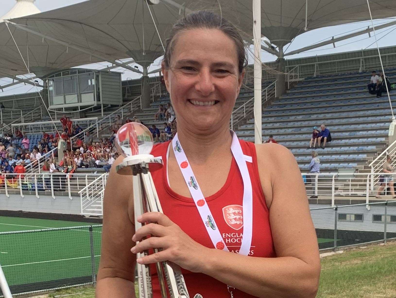 Sittingbourne Hockey Club's Claire Hales from Halfway with the Women's Over-50 Masters World Cup trophy