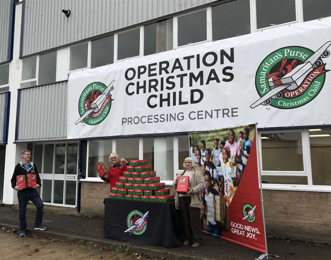 Operation Christmas Child Director, Nick Cole with volunteers Madeleine McClintock and Kate Goody Picture: Operation Christmas Child