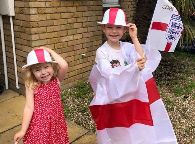 Roman, seven, and River, three, from Murston supporting England in the final game against Italy in the Euros 2020 in July