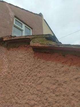 Fraudulent builders demanded £1,000 for putting a small amount of cement under some tiles on this house in Gillingham