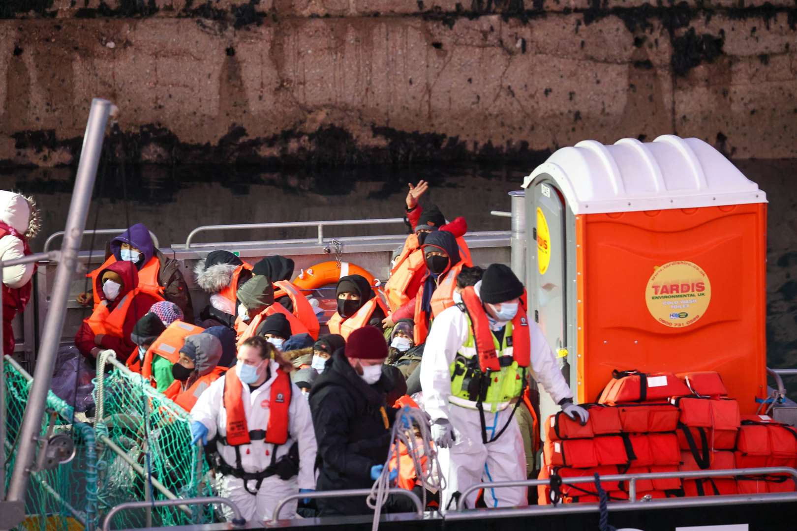 Migrants arriving at Dover aboard the Border Force boat Hurricane after being picked up near Ramsgate. Photo: UK News In Pictures
