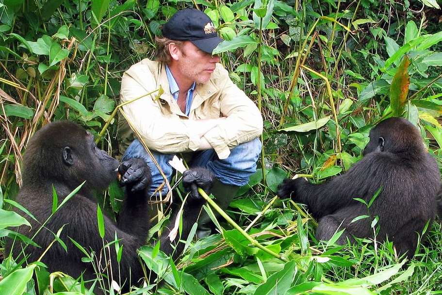 Conservationist Damian Aspinall with gorillas in Gabon in 2010