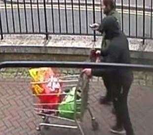 The pair were caught on CCTV carrying a trolley full of items. Picture: Kent Police