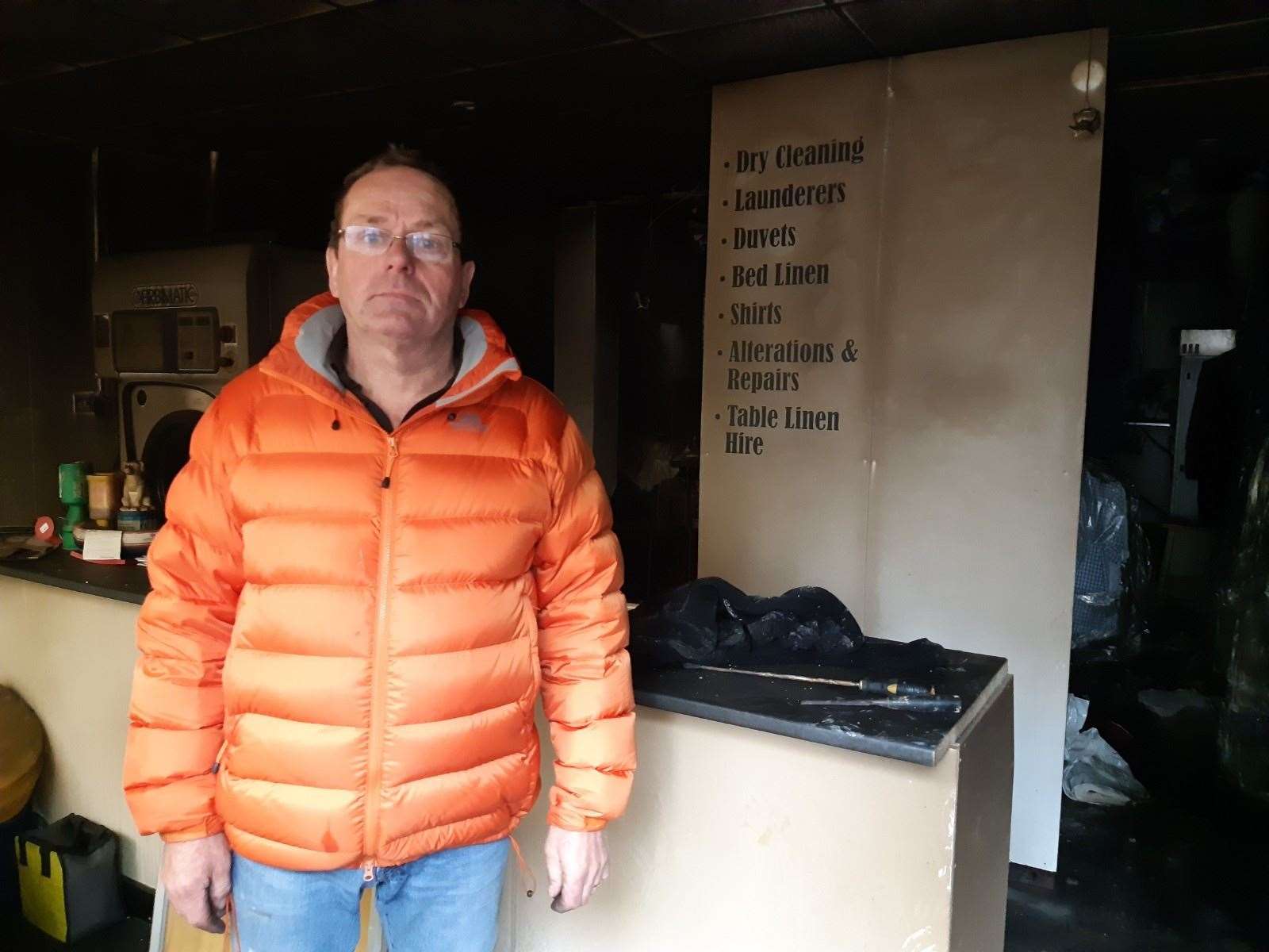 Distraught and empty: Jamie Stenhouse of Jill's Dry Cleaners after a fire has devastated the business in Broad Street
