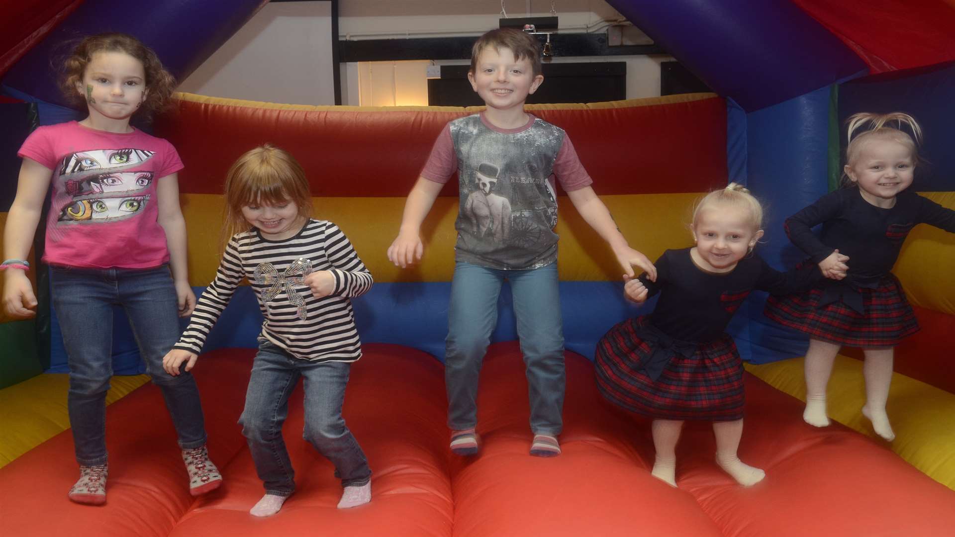 Children enjoying the bouncy castle at the Bubbles Memorial Fun Day held at the Sheerness East Working Men's Club