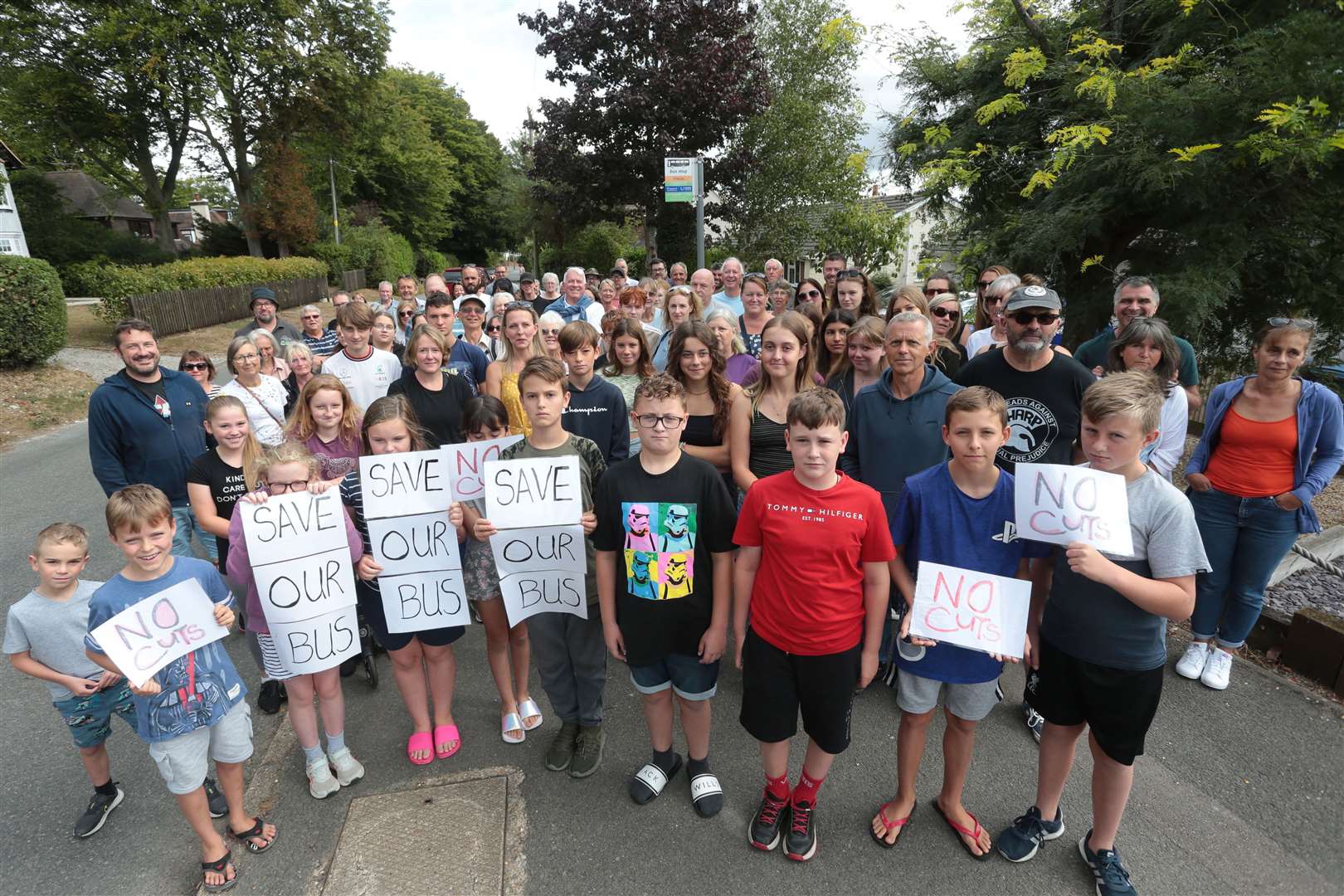 A mass of residents gather in Mill Lane,Shepherdswell, in protest at the proposed cuts. Picture by Nigel Bowles