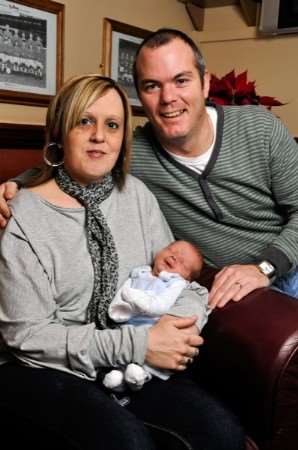 Sharon and Aidan Christie, with two-week-old son AJ