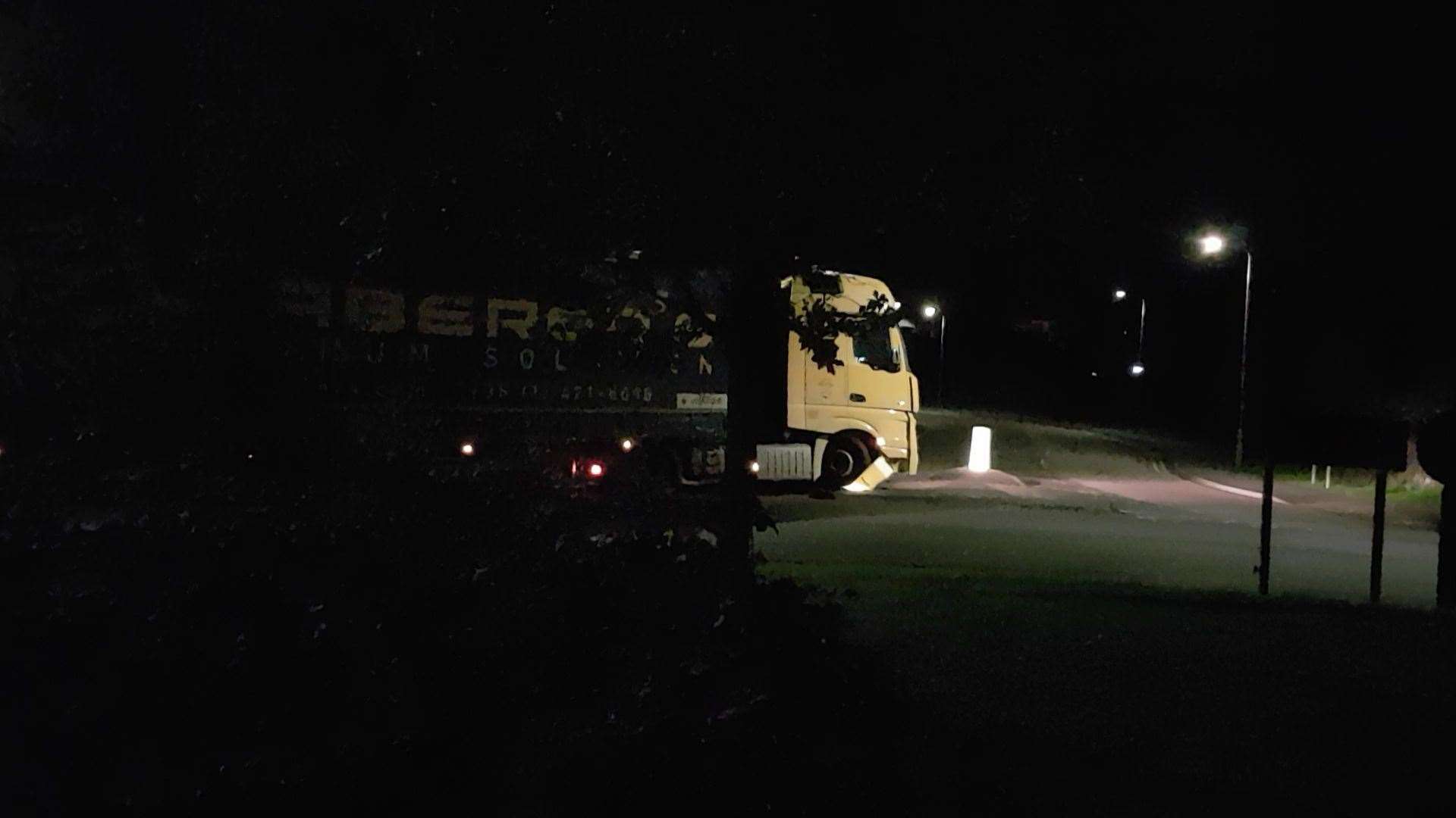The Waberer's-branded lorry running over the illuminated bollard (20400317)