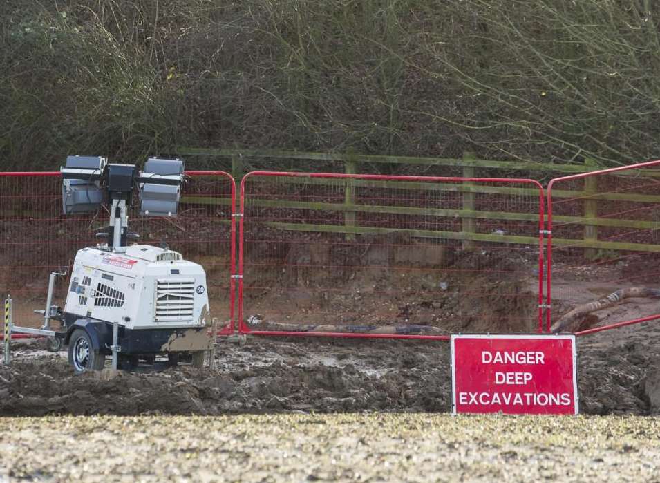 Machinery in the field for work on the A249 burst water main
