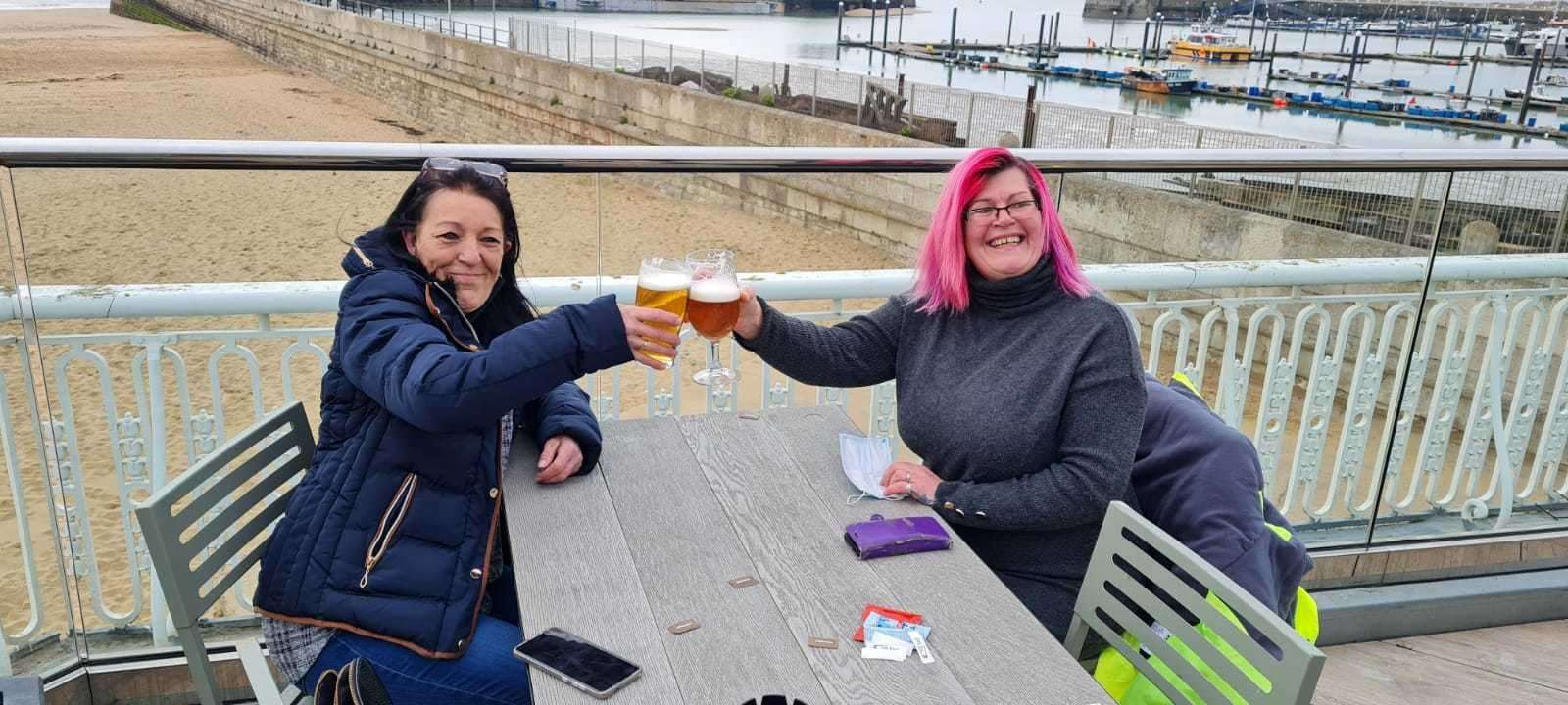 Sue Bell and Pippa Ingram raise a pint with their breakfast at Spoons in Ramsgate