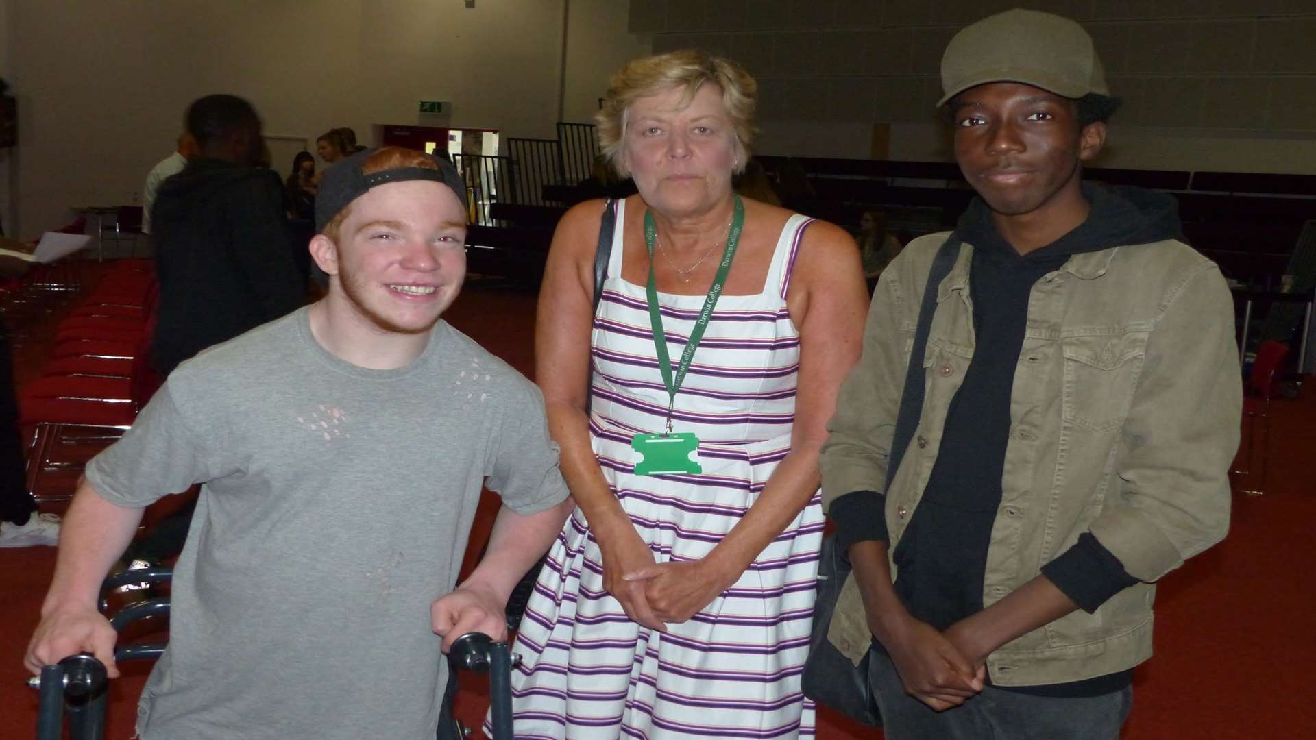 Charlie Randall, who gained a marketing apprenticeship with lifestyle photography, and Oluwaseyitan Osho who secured an apprenticeship with the BBC, celebrating with careers adviser Lesley Tannock