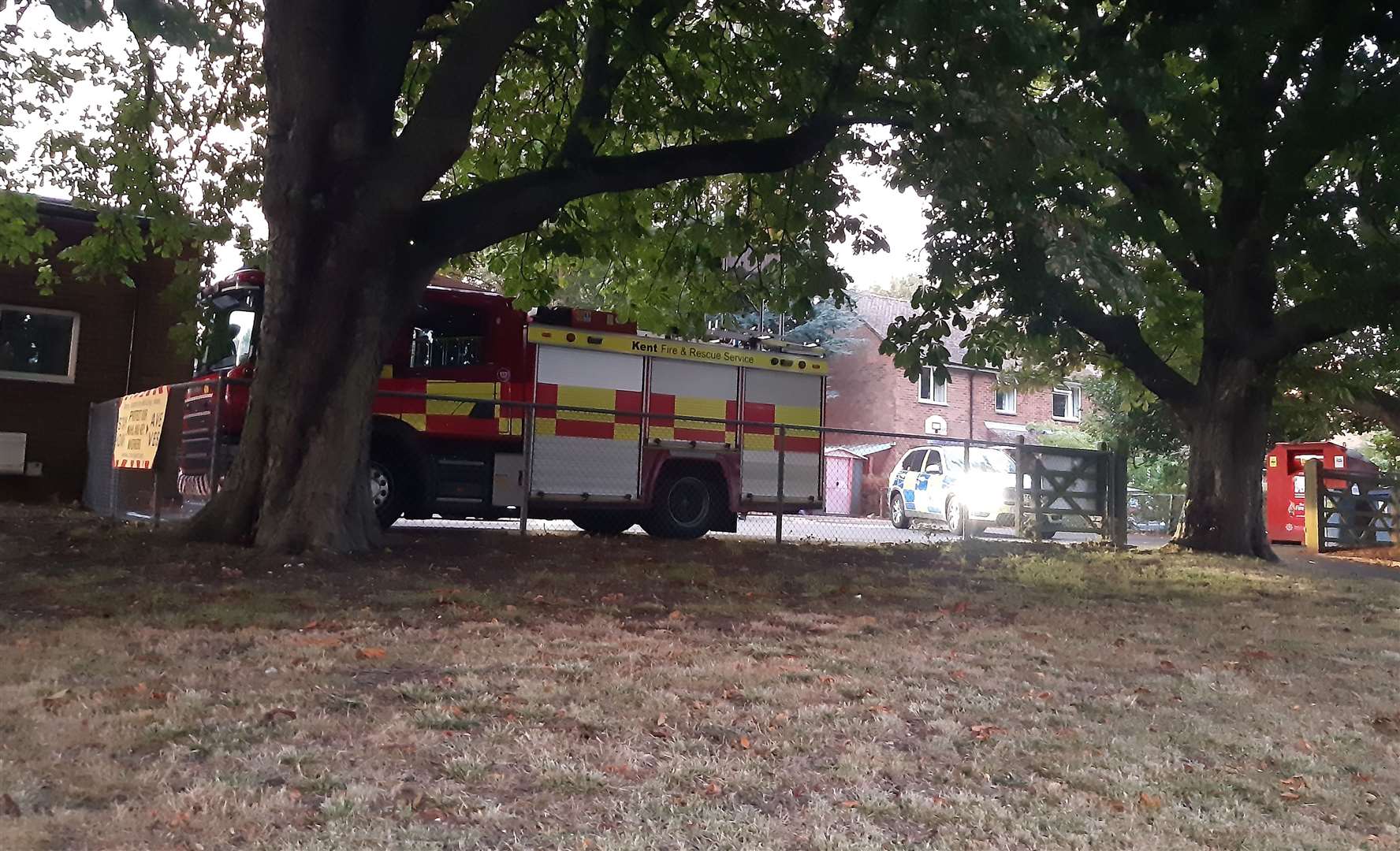 Armed police met in the Charing fire station car park